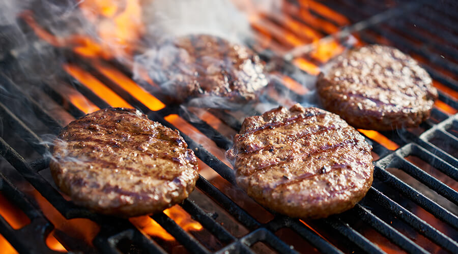burger patties on the barbecue