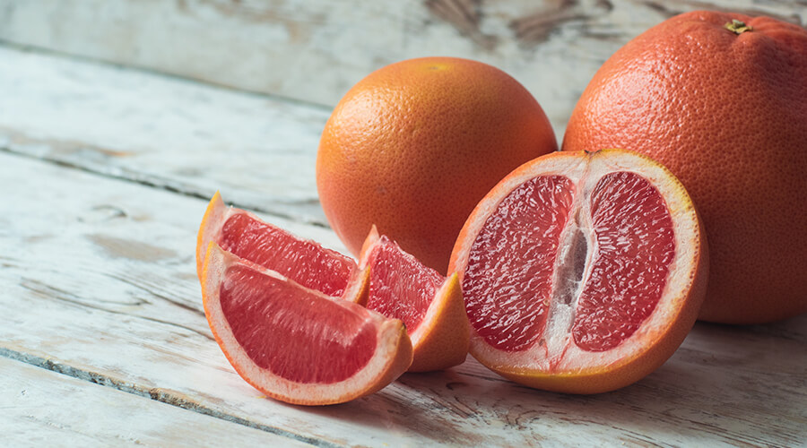 grape fruit on wooden table